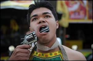 Click image for larger version. 

Name:	shocking-vegetarian-festival-in-thailand04.jpg 
Views:	5079 
Size:	33.3 KB 
ID:	2238